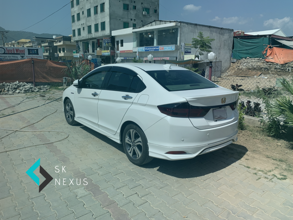 Honda Grace Hybrid 2015 with SK NEXUS Logo